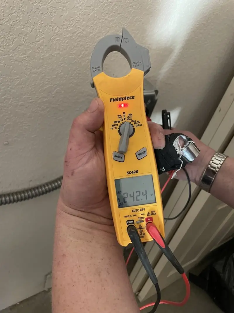 Voltage testing with clamp meter during Electrical Installation Services in South Orange Village